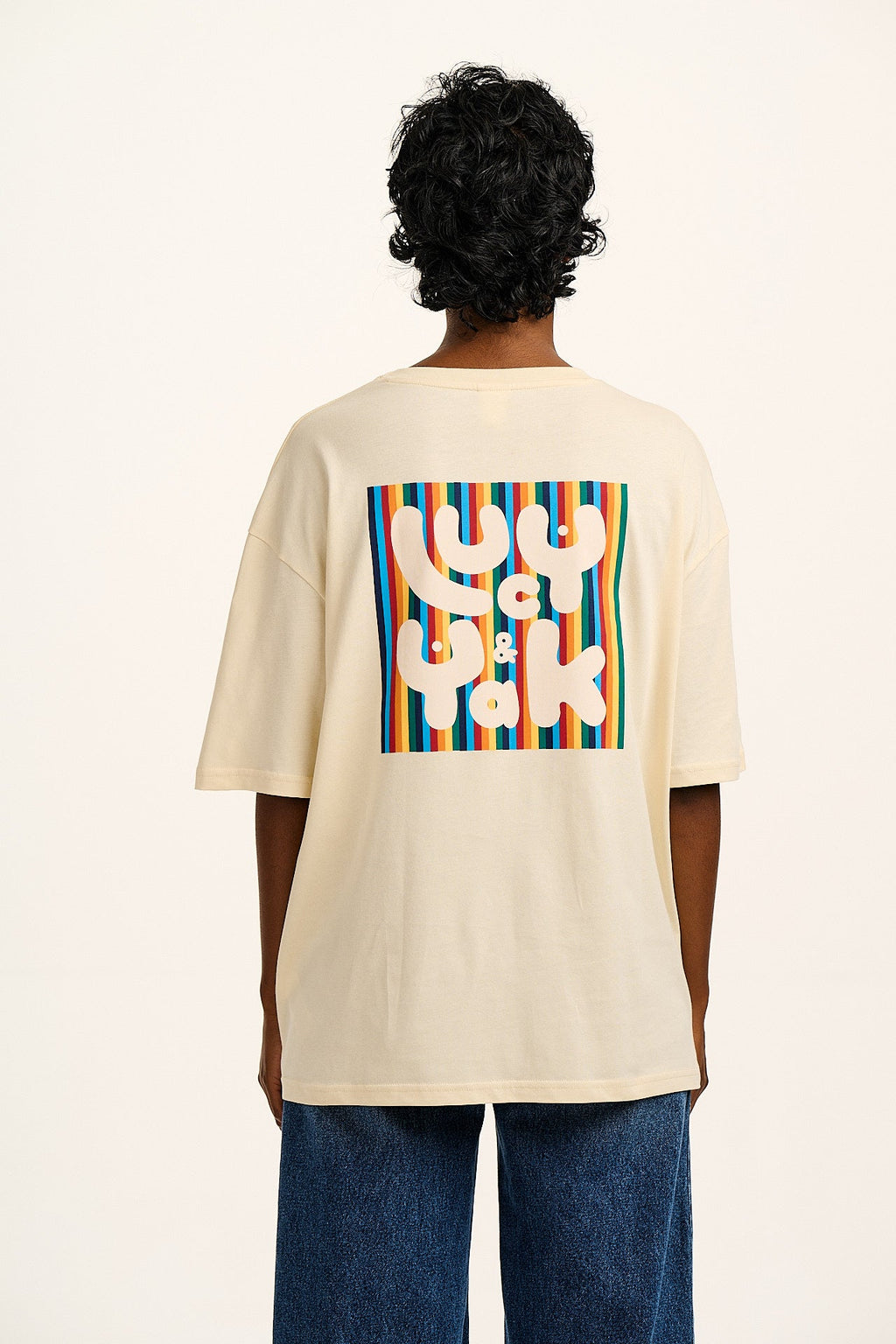 Benny - Organic Cotton Tee in Ecru with Logo Rainbow Stripe Print